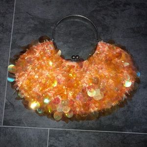 Orange sequin purse